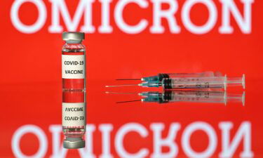 An illustration picture taken in London on December 2 shows a vial with Covid-19 vaccine sticker attached