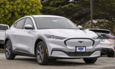 Ford is increasing output for its Mustang Mach-Es in 2022. Pictured is the Ford Mustang Mach-E electric sports utility vehicle at a dealership in Colma