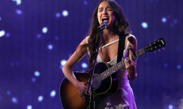 Olivia Rodrigo performs at the 2021 American Music Awards in Los Angeles. Rodrigo is planning on hitting the road in 2022. The "Drivers License" singer has announced her "Sour" tour in support of her debut album of the same name.