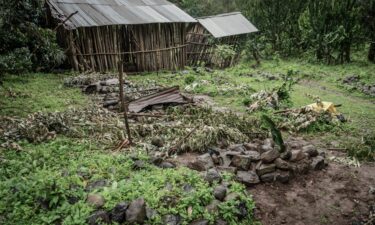 A mass grave for victims who were killed in an alleged massacre is seen in the village of Chenna