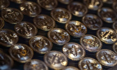 Bitcoin and other cryptos may become a little less volatile in 2022. Bitcoin and Ether hit all-time highs in a cryptocurrency rally that some analysts attributed partly to the search for a hedge against inflation.