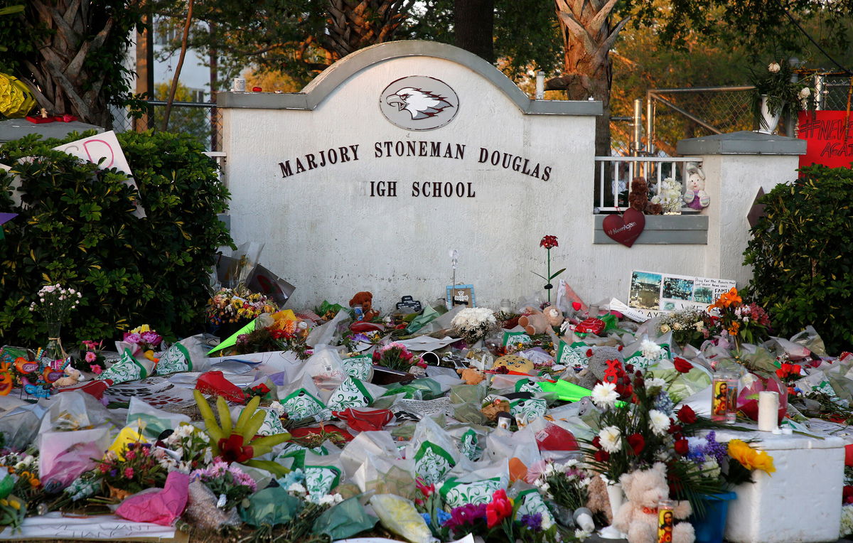 <i>Rhona Wise/AFP/Getty Images</i><br/>The Broward County public school district will pay more than $26 million to the shooting victims and the families of 17 people killed at Marjory Stoneman Douglas High School.