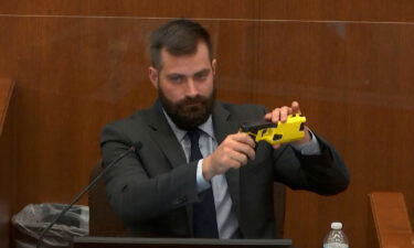 Special agent Sam McGinnis of the Minnesota Bureau of Criminal Apprehension explains the differences between Kim Potter's service weapon and a Taser.