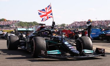 Lewis Hamilton celebrates his home win at Silverstone.