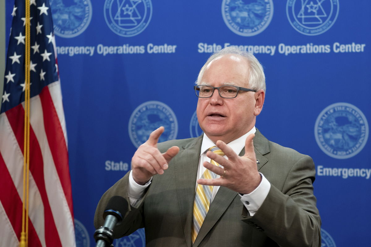 <i>Glen Stubbe/Star Tribune/AP</i><br/>Minnesota Governor Tim Walz and family test positive for Covid. Walz is seen here at a news conference in May 2020.