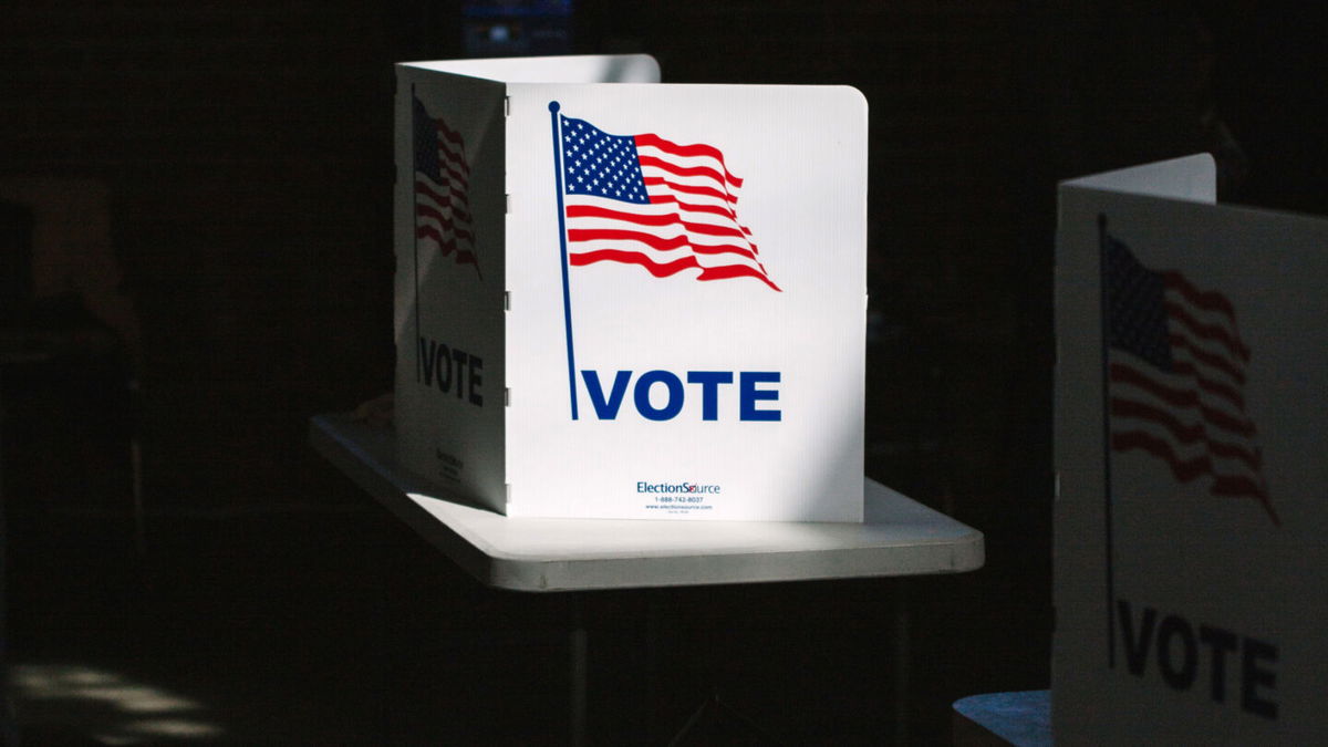 <i>Scotty Perry/Bloomberg/Getty Images</i><br/>A voting booth at a polling location for the 2020 Presidential election in Louisville