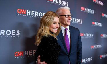 Kelly Ripa (L) and Anderson Cooper attend CNN Heroes at the American Museum of Natural History on December 08