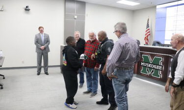 The Muskogee Police Department presented Davyon Johnson with an honorary officer certificate.