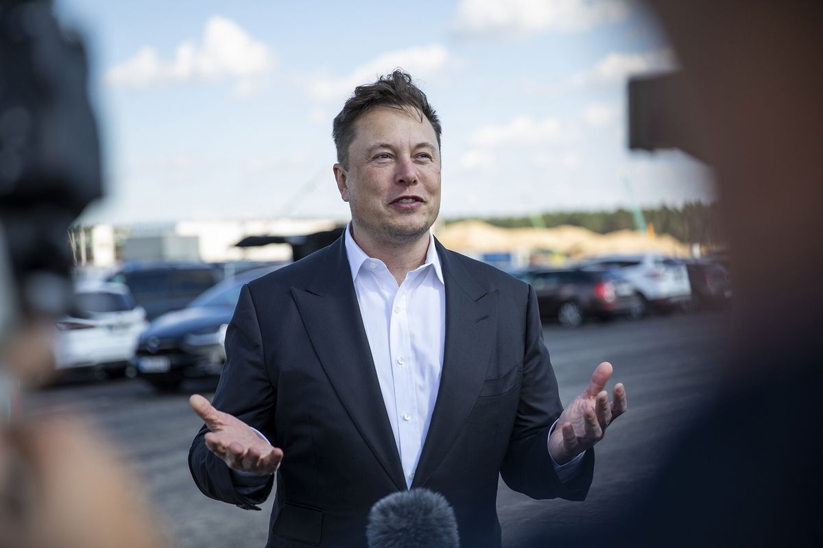 <i>Maja Hitij/Getty Images</i><br/>Tesla head Elon Musk talks to the press as he arrives to to have a look at the construction site of the new Tesla Gigafactory near Berlin on September 03