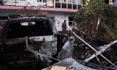 A view of the damaged caused at the scene of an attack near the Hamid Karzai International airport