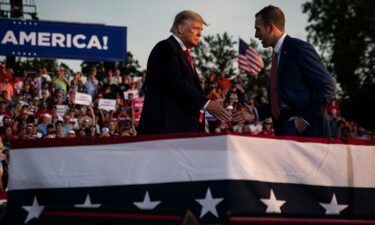 Former President Donald J. Trump speaks with Republican congressional candidate Max Miller at a rally at the Lorain County Fairgrounds in June in Wellington