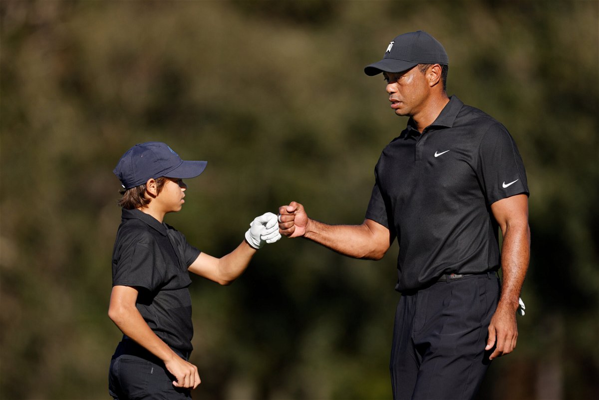 <i>Douglas P. DeFelice/Getty Images</i><br/>Tiger Woods is competing with his 12-year-old son