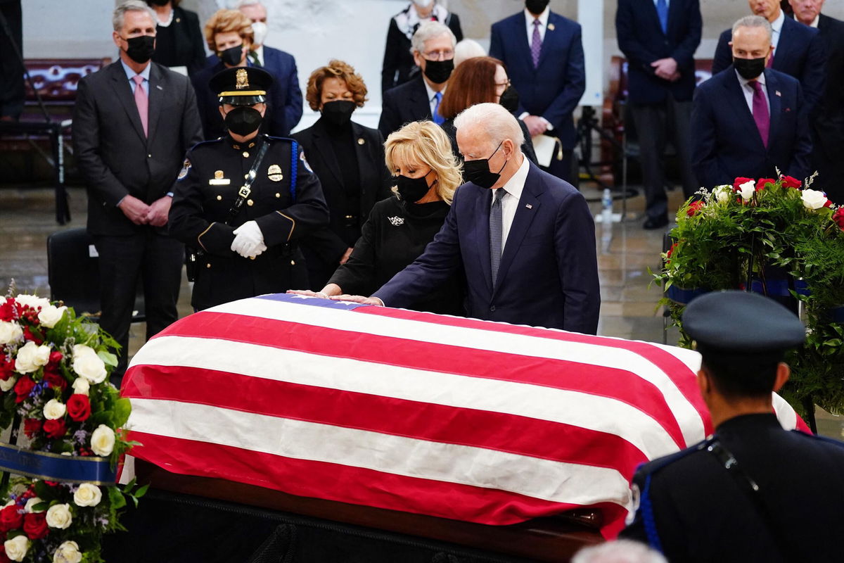 <i>Shawn Thew/Pool/AFP/Getty Images</i><br/>Sen. Bob Dole's funeral service set to take place at Washington National Cathedral. US President Joe Biden (R) and US First Lady Dr. Jill Biden are seen in Washington