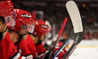 Teuvo Teravainen #86 of the Carolina Hurricanes pays tribute on January 8 to high school student Teddy Balkind