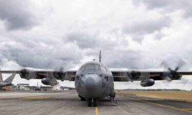 A Royal New Zealand Air Force C-130 Hercules prepares to leaves an airbase in Auckland