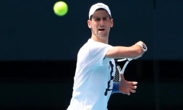 Novak Djokovic of Serbia practices on Rod Laver Arena ahead of the 2022 Australian Open at Melbourne Park on January 11