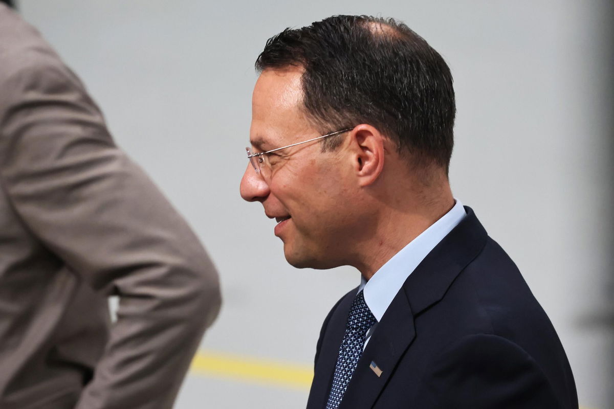 <i>Michael M. Santiago/Getty Images</i><br/>Pennsylvania Attorney General Josh Shapiro speaks with people as he awaits a speech from U.S. President Joe Biden at Mack Truck Lehigh Valley Operations on July 28