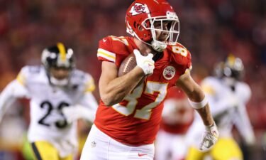 Travis Kelce's mom surprises him with question at postgame news conference after two games in one day. Kelce is here running for a touchdown in the second quarter against the Pittsburgh Steelers.