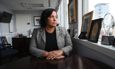 Then-Suffolk District Attorney Rachael Rollins poses in her office in Boston on August 19