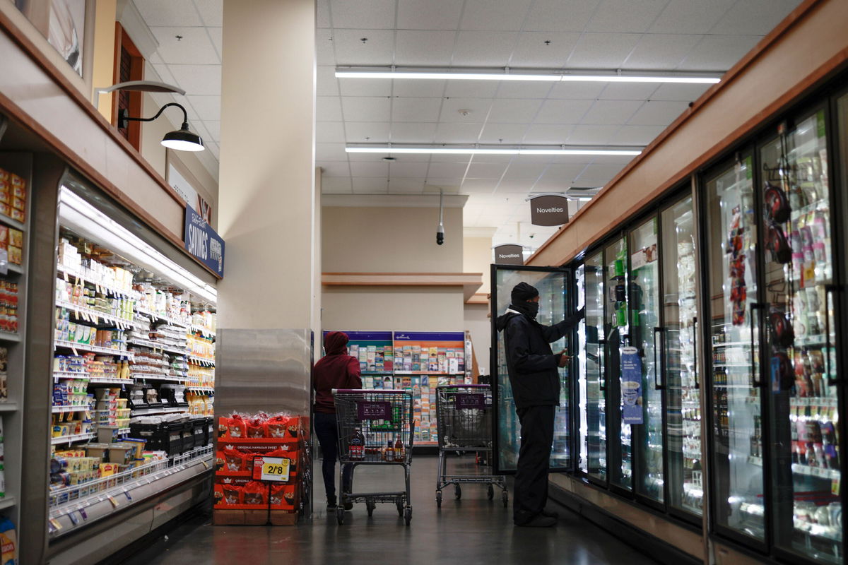 <i>Anna Moneymaker/Getty Images</i><br/>Customers shop at a Giant Food supermarket in 2021 in Washington