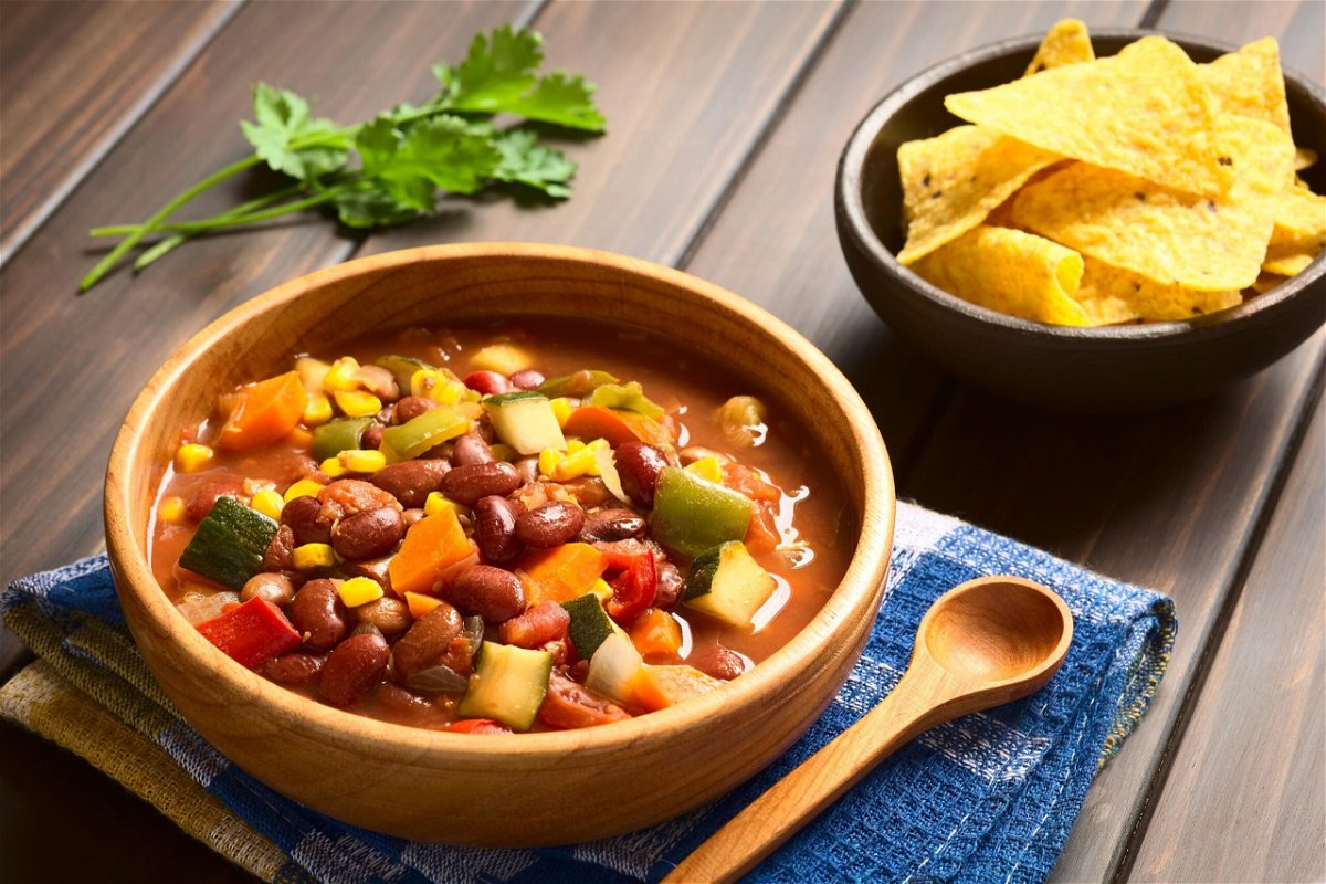 <i>Adobe Stock</i><br/>Make a vegetarian chili jam-packed with a rainbow of diced veggies and serve with tortilla chips.
