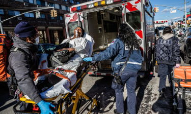 Outside a hotel temporarily housing the evacuated residents of a deadly fire