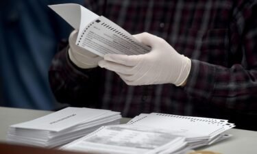 Mail-in ballots are opened to be counted in Luzerne County