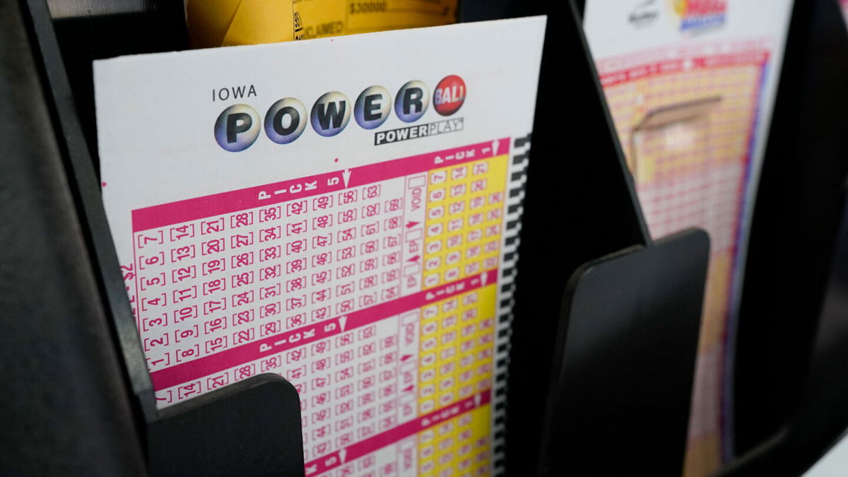 <i>Charlie Neibergall/AP</i><br/>A ticket to play Powerball costs $2.