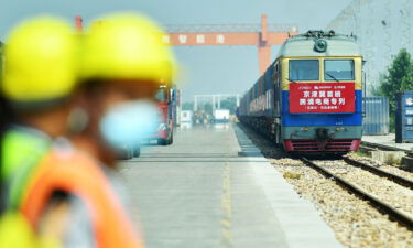 A train carrying 50 containers departs from China's Shijiazhuang International Land Port to Malaszewicze port in Poland on September 9