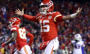 Patrick Mahomes celebrates a touchdown scored by Tyreek Hill against the Buffalo Bills.