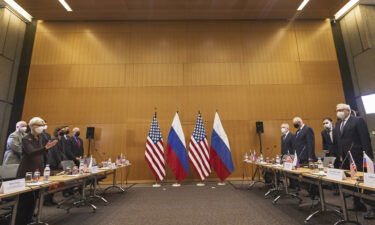 Wendy Sherman (L) and Sergey Ryabkov (R) attend security talks on Monday in Geneva