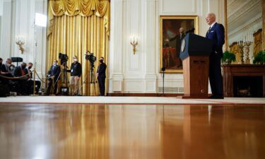 President Joe Biden answers questions during a news conference in the East Room of the White House on January 19