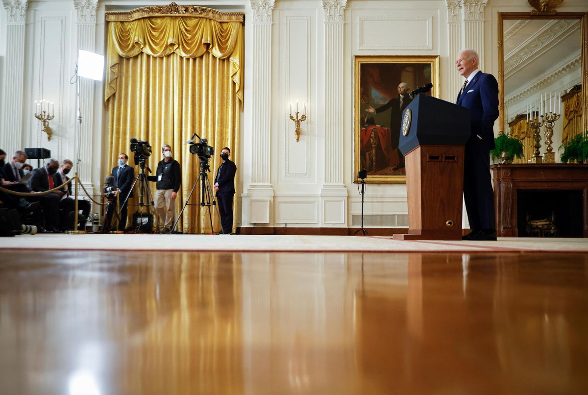 <i>Chip Somodevilla/Getty Images</i><br/>President Joe Biden answers questions during a news conference in the East Room of the White House on January 19