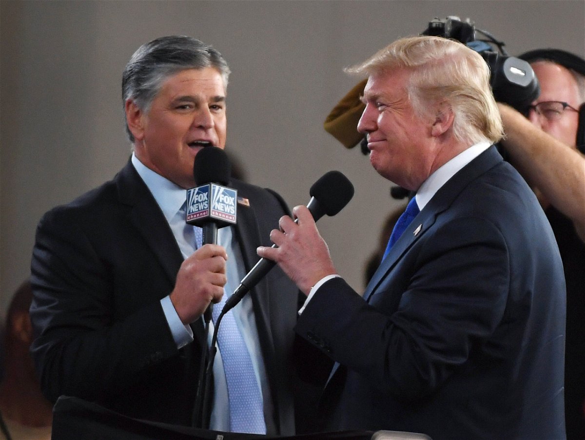 <i>Ethan Miller/Getty Images North America/Getty Images</i><br/>Fox News Channel and radio talk show host Sean Hannity (L) interviews U.S. President Donald Trump before a campaign rally at the Las Vegas Convention Center on September 20