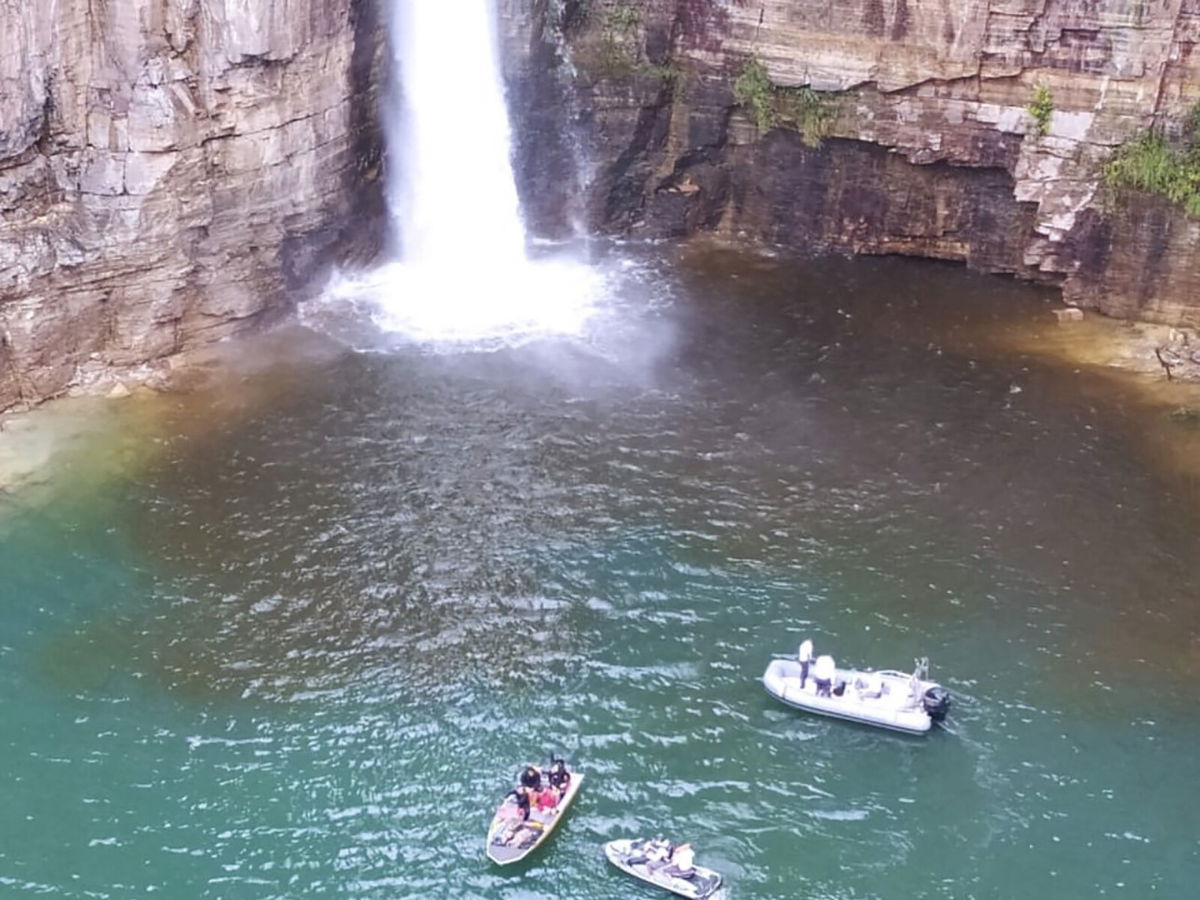 <i>Minas Gerais Fire Deparment</i><br/>Rescue efforts are still underway in Brazil after a rock formation fell on three boats.