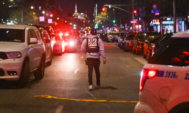 Police at the scene after two NYPD officers were shot in Harlem on January 21. The gun used to kill the officers was stolen in Baltimore five years ago