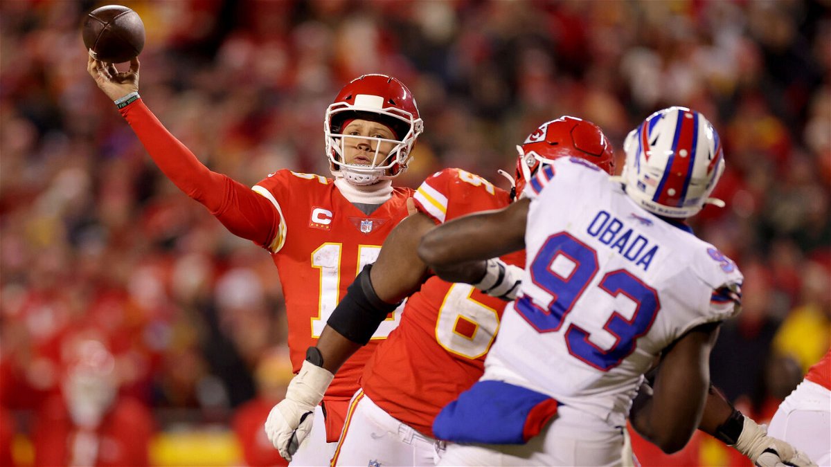 <i>David Eulitt/Getty Images</i><br/>Chiefs quarterback Patrick Mahomes throws the game-winning touchdown to Kelce.
