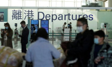 Hong Kong police have arrested and charged two former Cathay Pacific staffers for violating the city's quarantine rules