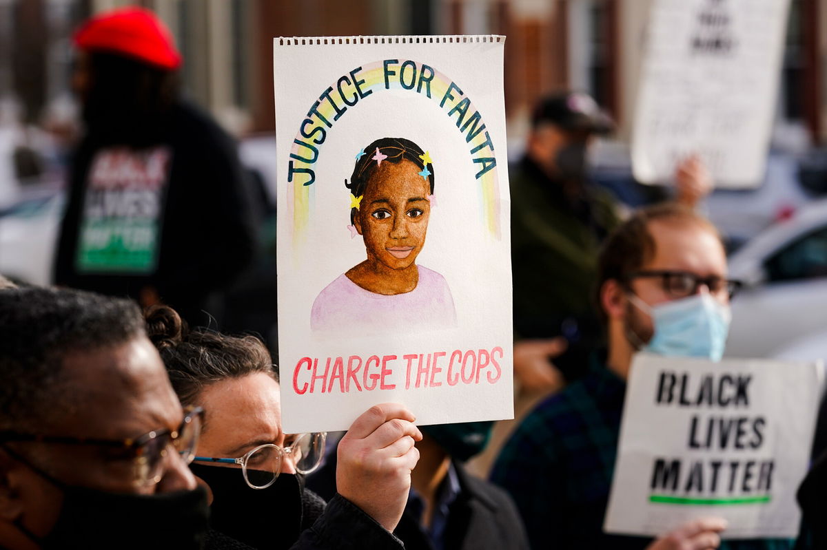 <i>Matt Rourke/AP</i><br/>3 Pennsylvania officers were fired after being charged in the fatal shooting of 8-year-old Fanta Bility. Protesters calling for police accountability are pictured here in Media