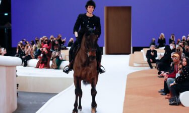 Charlotte Casiraghi rides a horse on the runway during the Chanel Haute Couture Spring/Summer 2022 show as part of Paris Fashion Week at Le Grand Palais Ephemere on January 25 in Paris