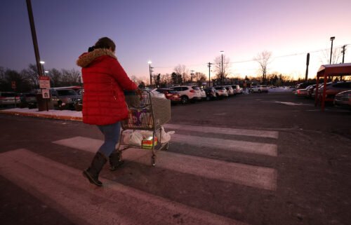 A shopper leaves a ShopRite on January 8 in Clark