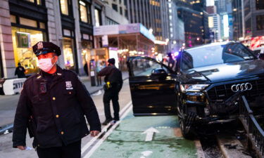 The NYPD at the scene of a suspected carjacking just north of Times Square on January 12. The number of carjackings quadrupled in New York City over the last four years.