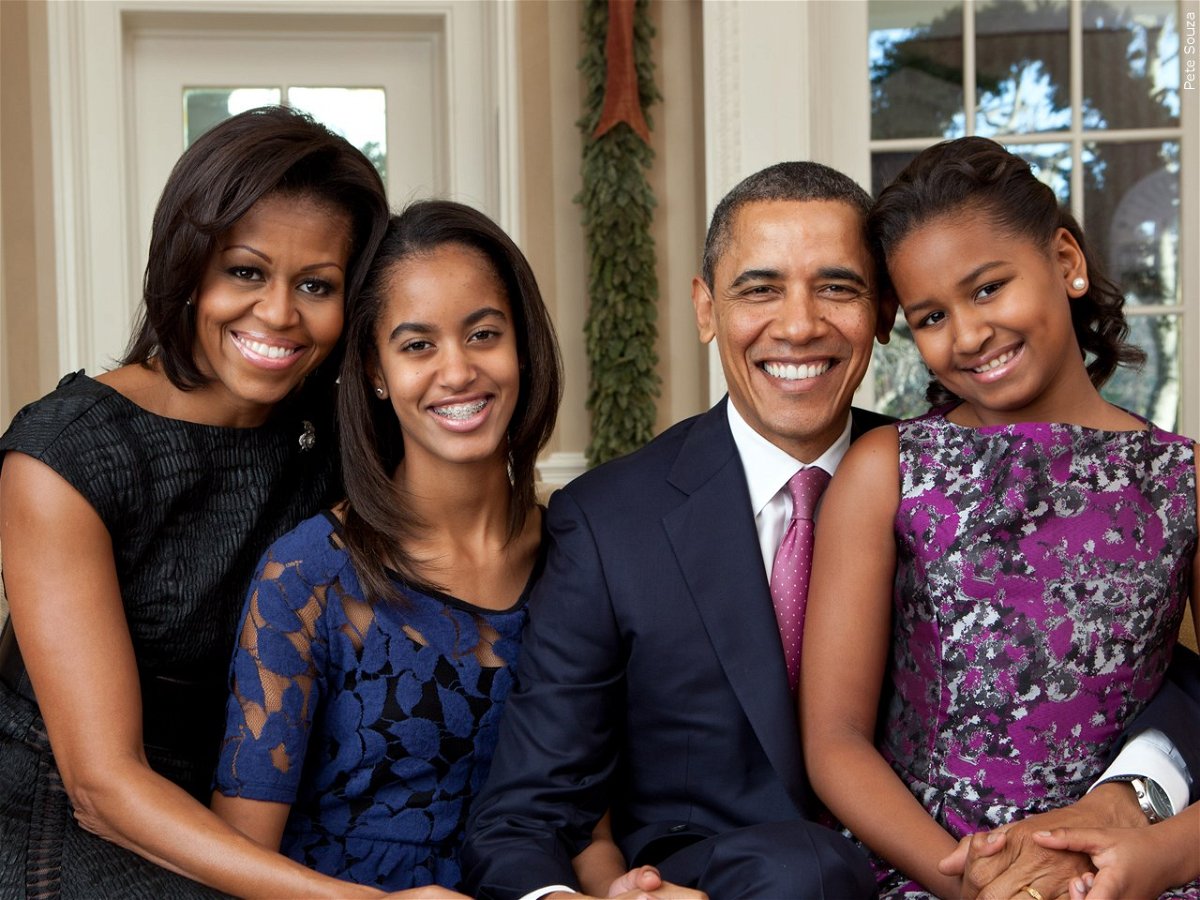 Former President Barack Obama, seen here with wife Michelle and their two daughters. The Obamas' first date is the subject of a film being screened for Black History Month.