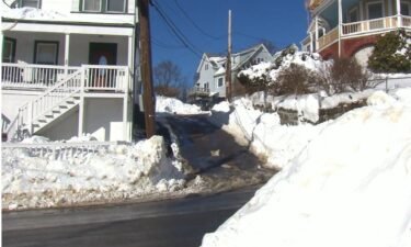 Lynn man spends the night in his truck after plows block off the street during a blizzard.