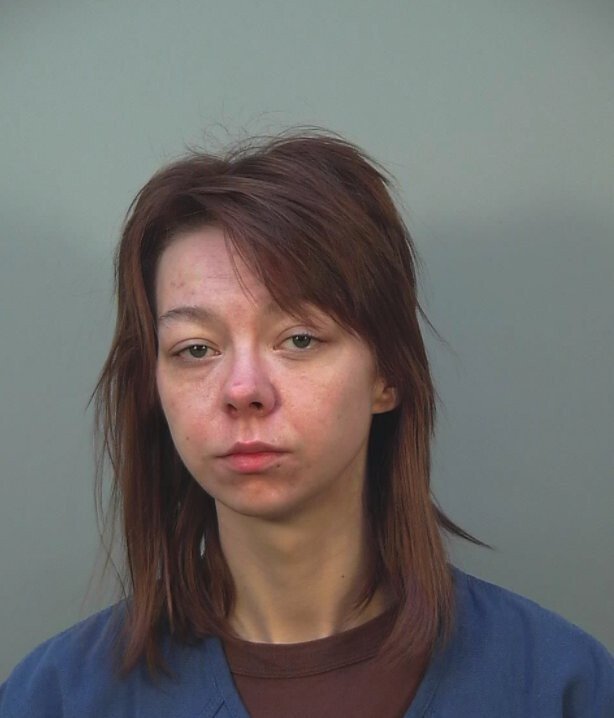 Woman with Milwaukee murder victim in car's back seat charged with ...