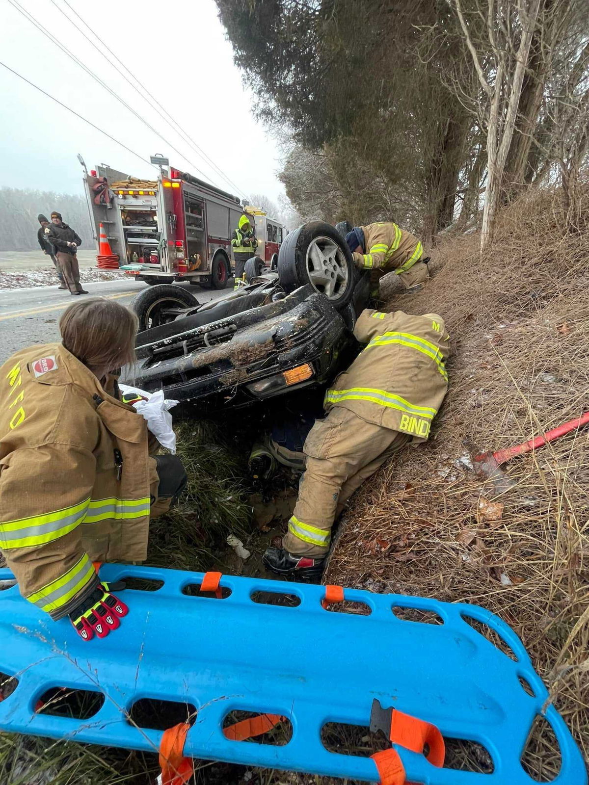 <i>Monroe Township FD/WLKY</i><br/>A woman and her two dogs were pulled to safety from a car that flipped over into a ditch.
