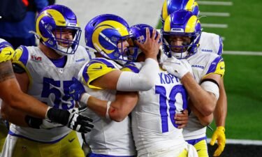 Los Angeles Rams wide receiver Cooper Kupp is embraced by quarterback Matthew Stafford after a touchdown in the fourth quarter.
