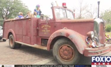 The "Loyal Order of the Fire Truck" participates in the People's Parade  in Daphne