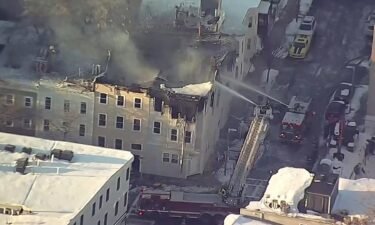 Firefighters battle a blaze in Boston on February 28.