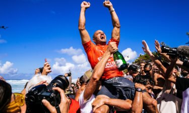 Kelly Slater celebrated after winning the Billabong Pro Pipeline on February 5 in Haleiwa